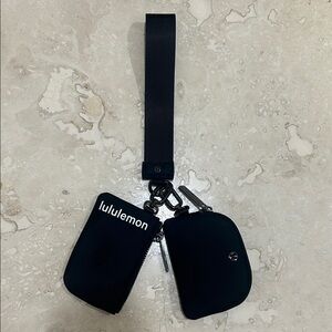 Never worn!! lululemon athletica Black Wristlet Set